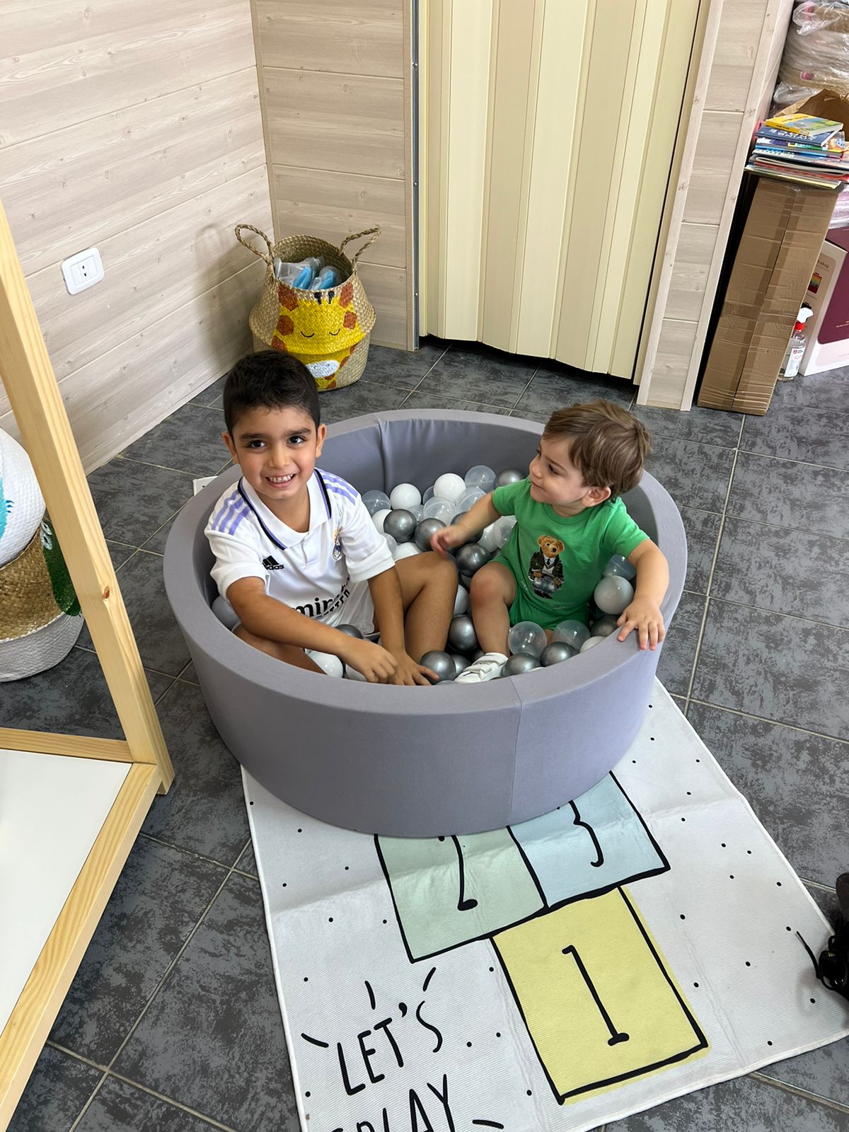 Ball pool pit includes 200 balls