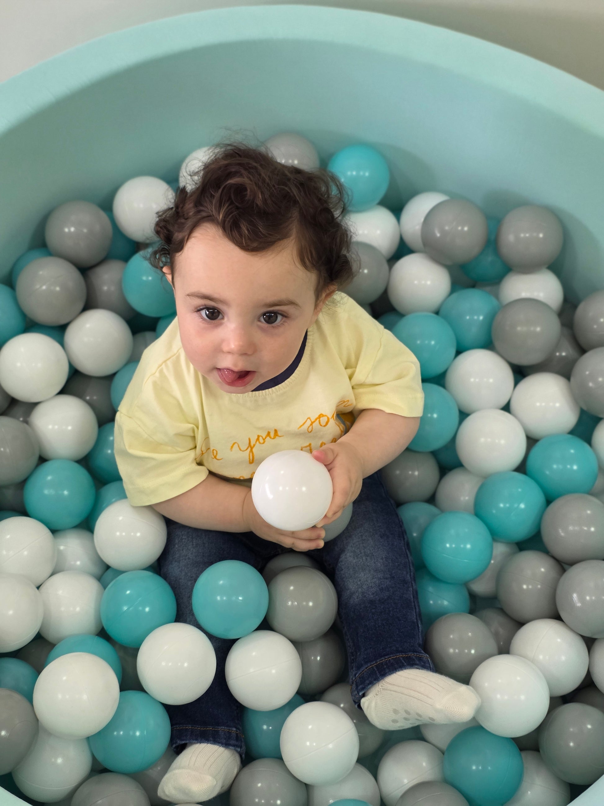 Ball pool pit includes 200 balls
