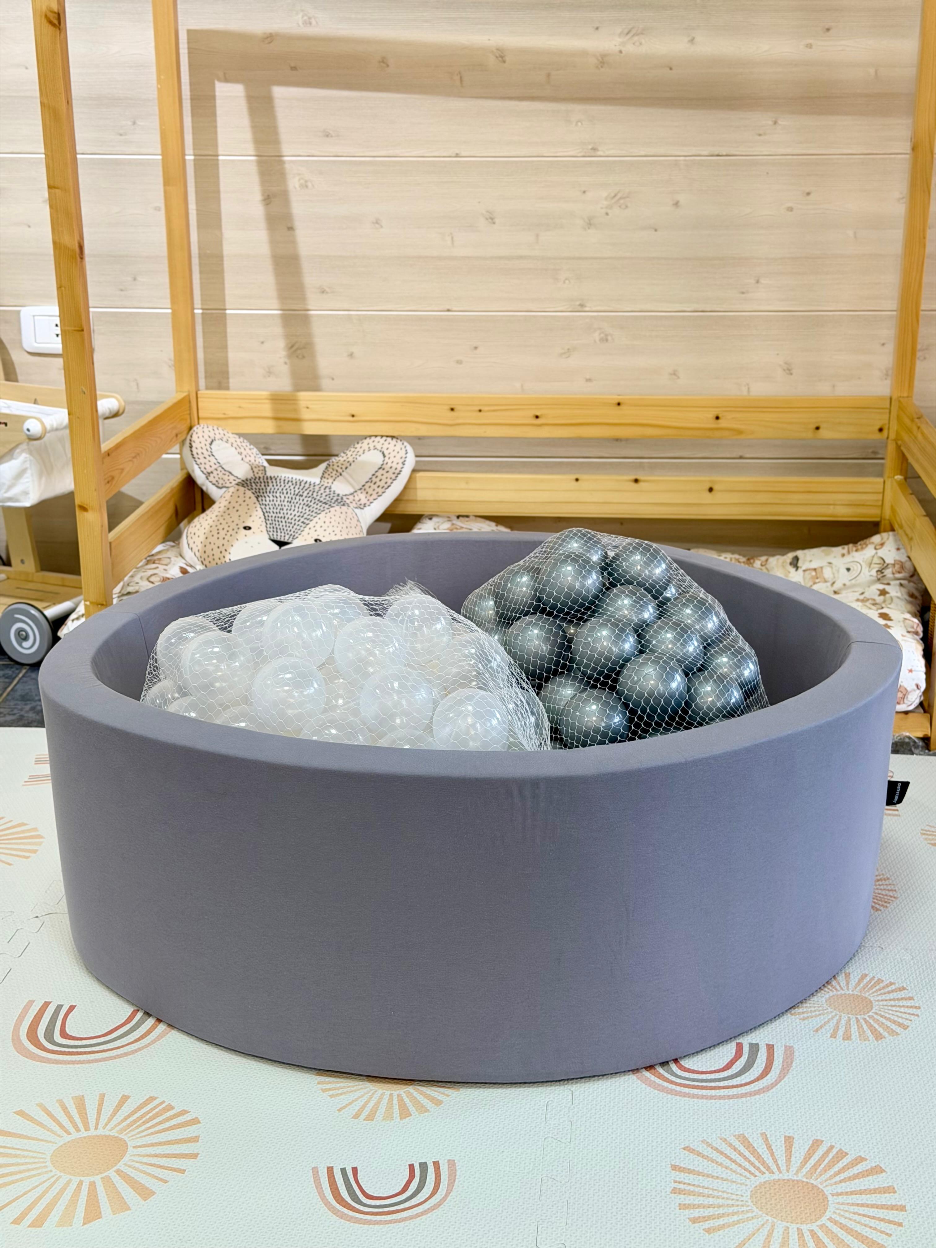 Ball pool pit includes 200 balls